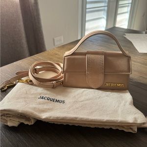 Le bambino suede top handle bag